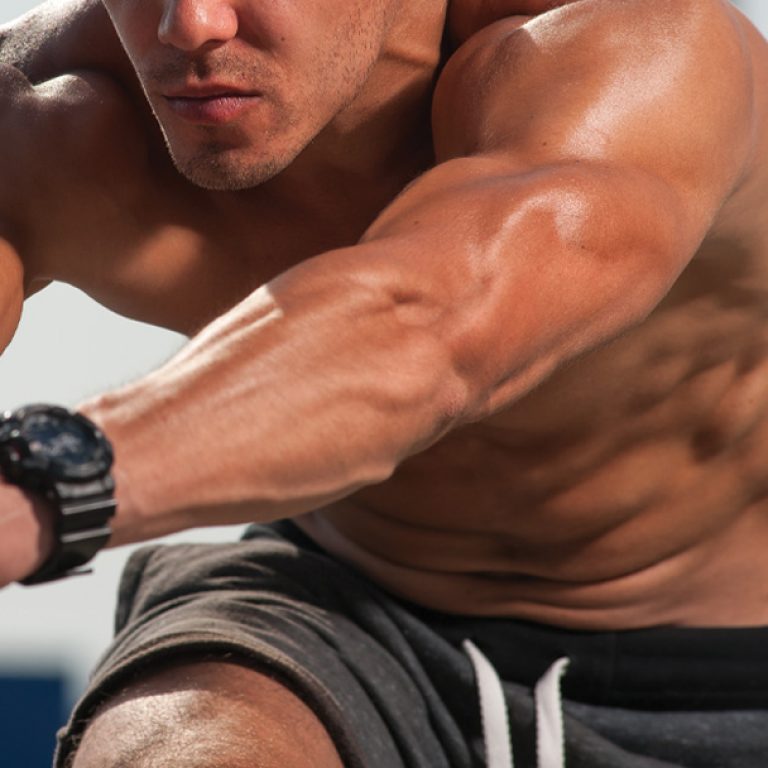Fit man stretching and preparing to run after receiving a health and wellness consultation from Men's Only Medical in West Palm Beach and Palm Beach, including weight loss, diet plans, and other men's health services.